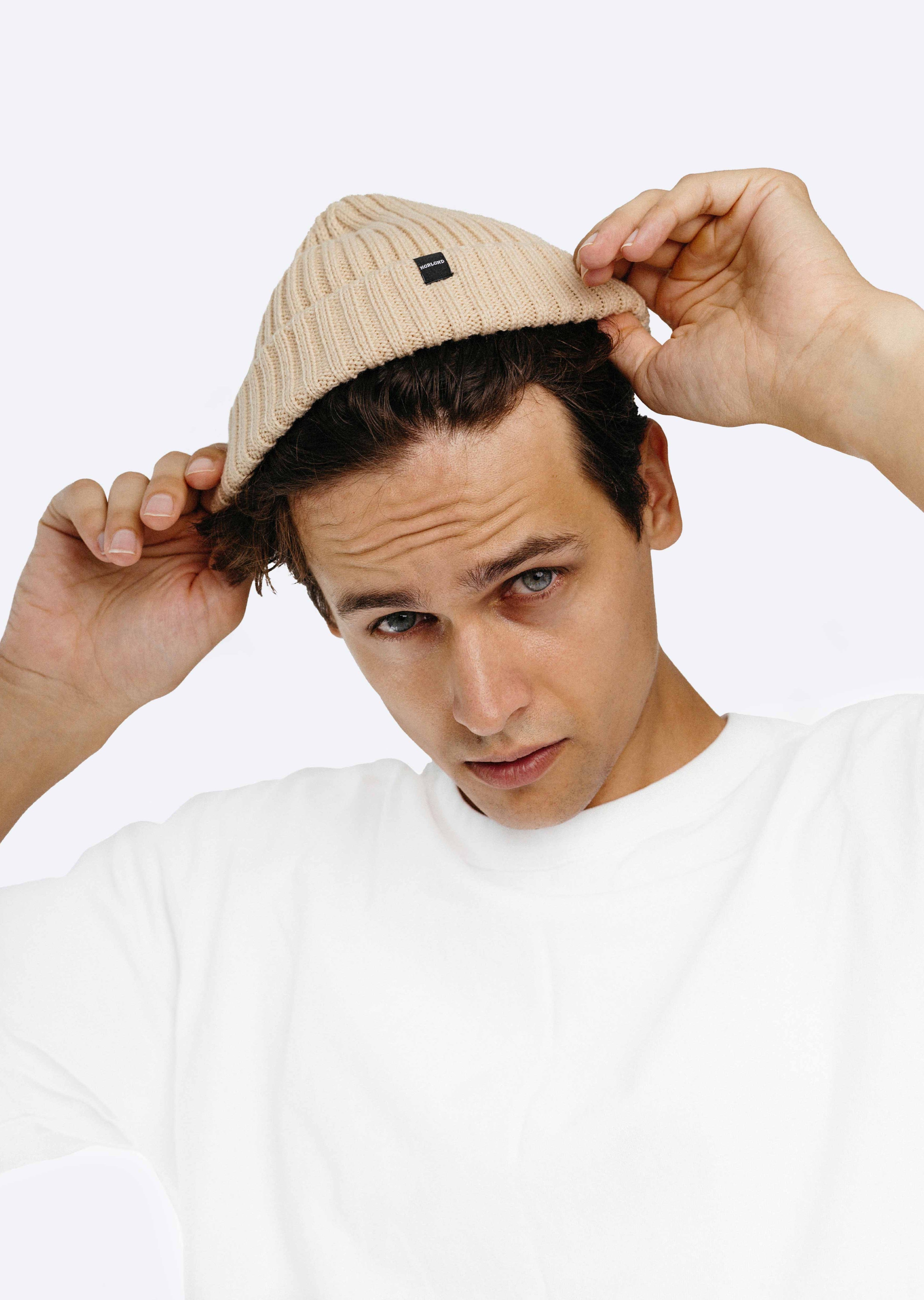 Male model wearing a fisherman beanie